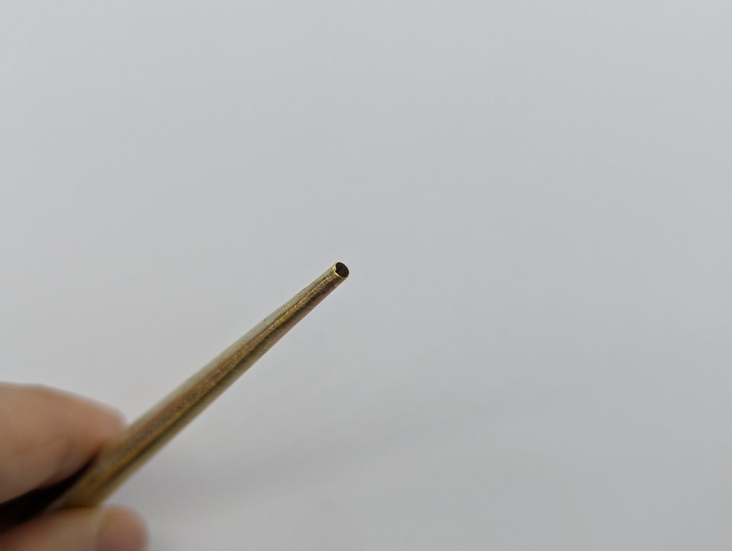 Hole puncher (for teapot)